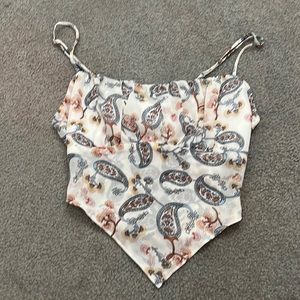 cute summer top that has an adjustable tie in the back